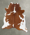 Brown and White XX-Large Brazilian Cowhide Rug 8'1