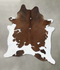 Brown and White XX-Large Brazilian Cowhide Rug 8'10