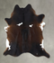 Chocolate and White XX-Large Brazilian Cowhide Rug 7'9