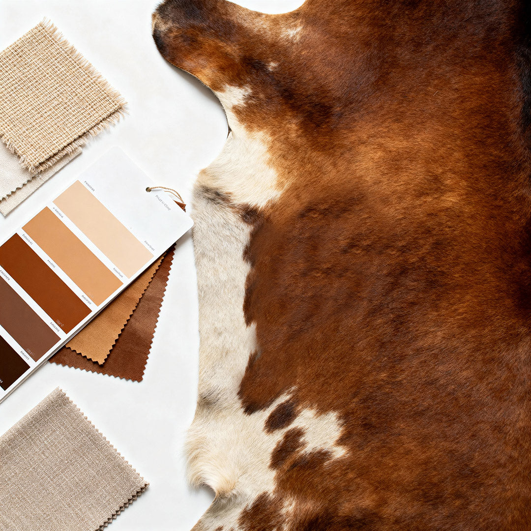 Close-up of a natural brindle cowhide rug showing rich texture and color variation