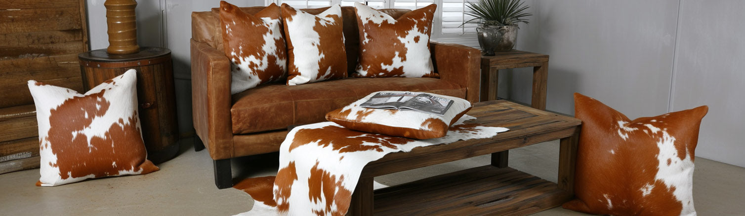 Brown and White Cowhide Pillows