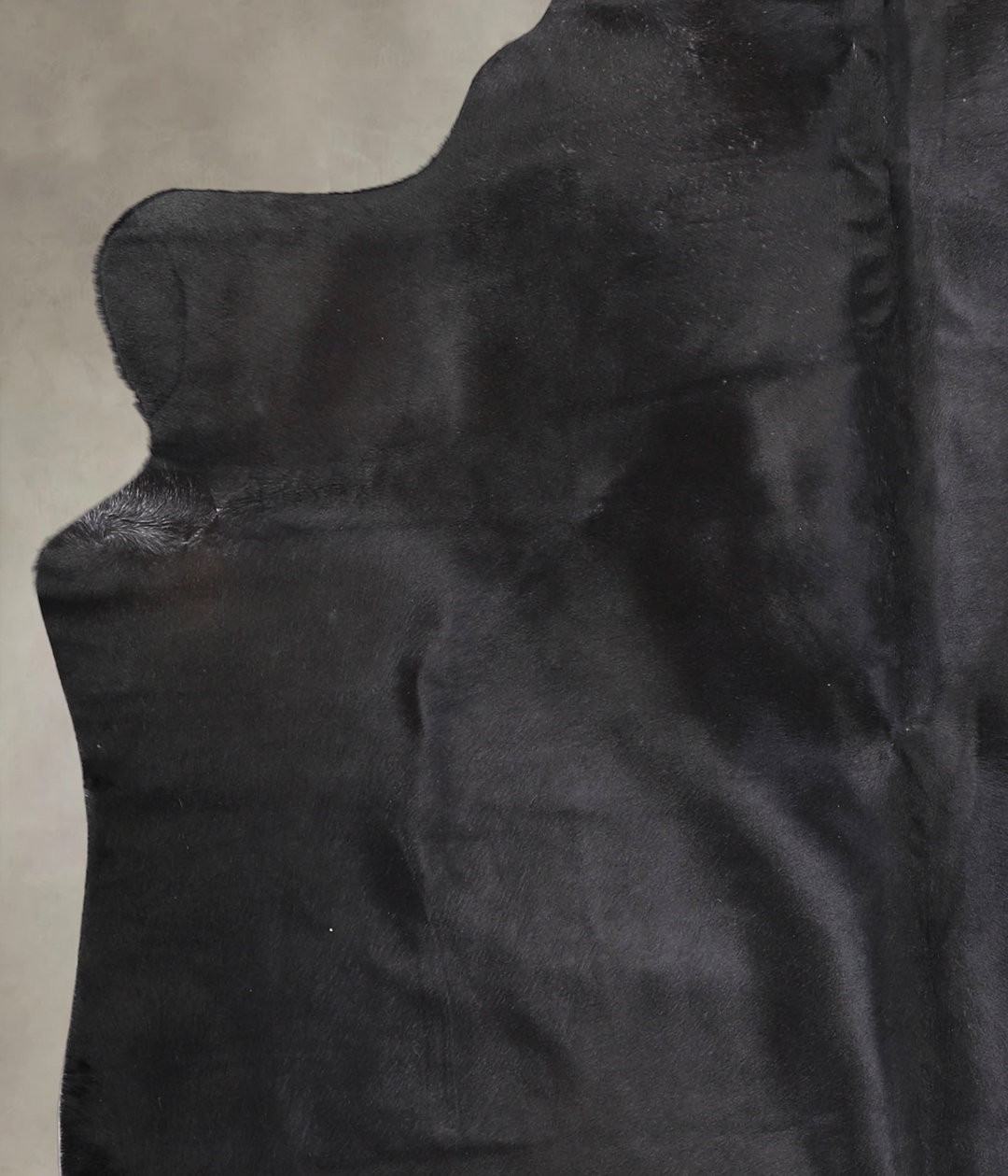 Solid Black X-Large Brazilian Cowhide Rug 7'0"H x 6'7"W #A25144 by Hud