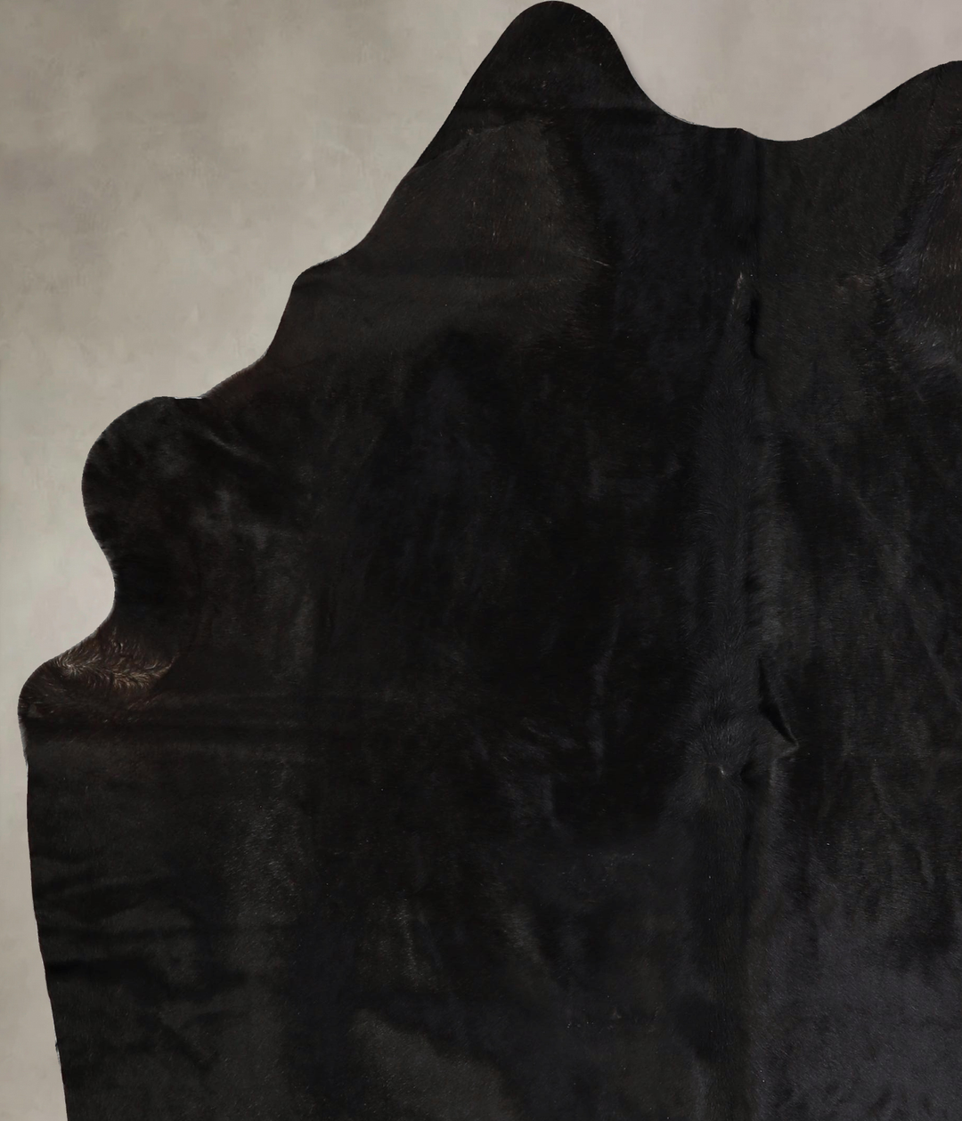 Solid Black X-Large Brazilian Cowhide Rug 7'1"H x 5'8"W #A43127 by Hud