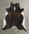 Chocolate and White XX-Large Brazilian Cowhide Rug 7'7
