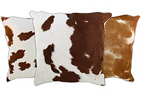 Brown and White Cowhide Pillows
